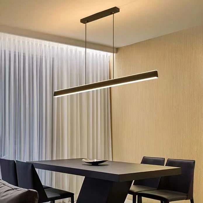 Modern dining room with a long Modern Minimalist Trapezoid LED Bar light fixture.