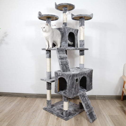 Cat tree with multiple levels and a cat perched on one of the platforms.