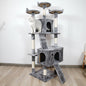 Cat tree with multiple levels and a cat perched on one of the platforms.